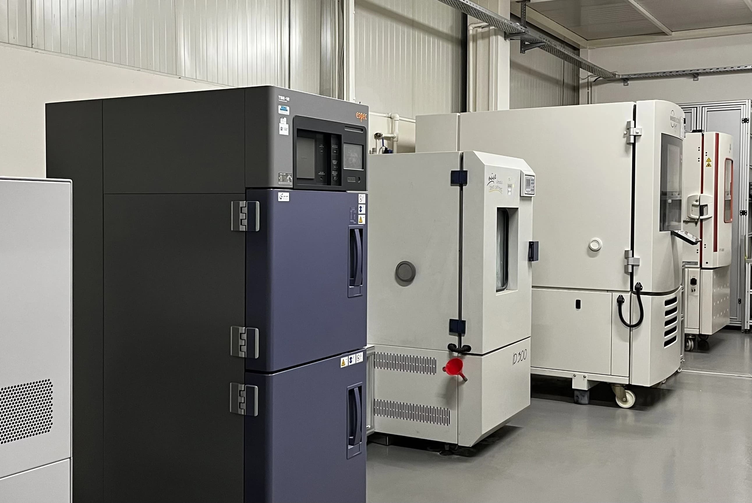 Row of environmental test chambers including an ESPEC thermal-shock chamber in the Makersan laboratory