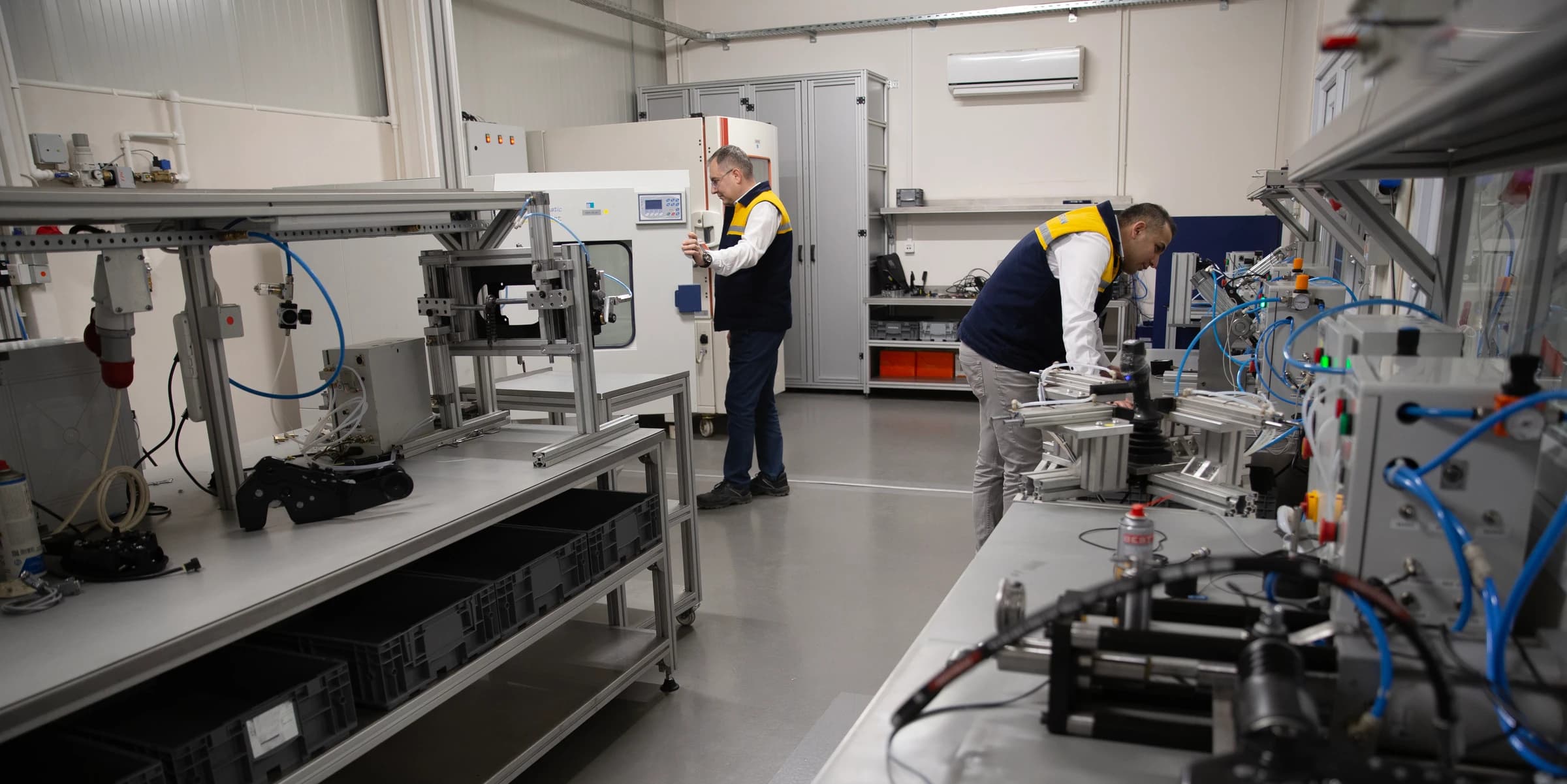 Engineers running endurance test benches in the Makersan R&D laboratory